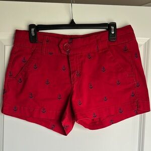 Red shorts with embroidered anchors